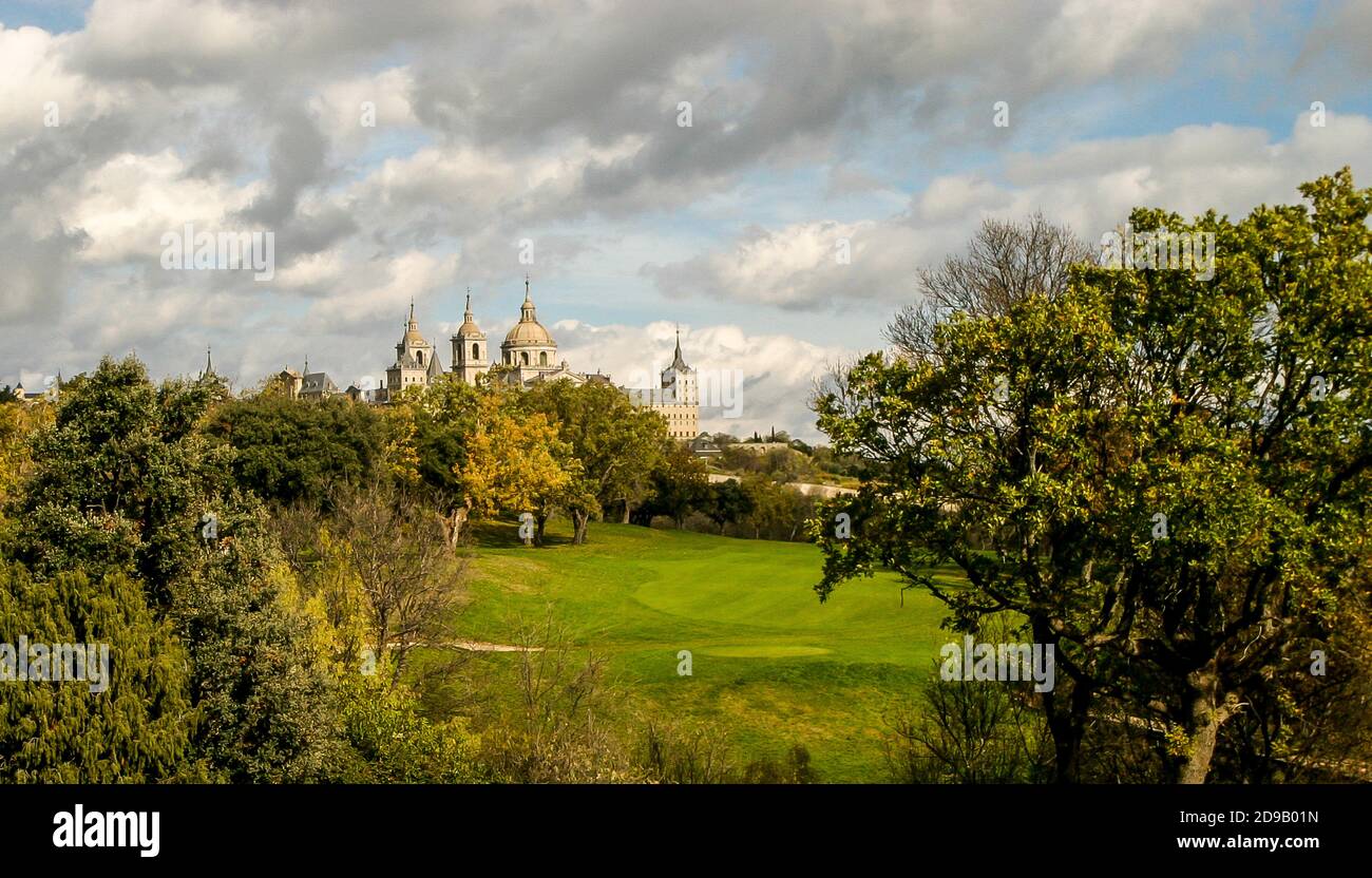 View of the Monastery of San Lorenzo del Escorial from the La Herreria golf course in Madrid, Spain Stock Photo