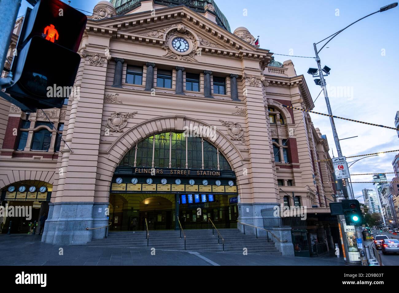 There are hardly any people at Flinders Street station central Melbourne because of the coronavirus lockdown in Australia Stock Photo