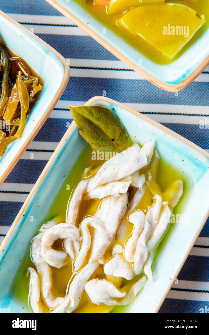 Seafoods, grilled meat, meze, herbs, fish, raki, ouzo, appetizers and salads in Greek or Turkish