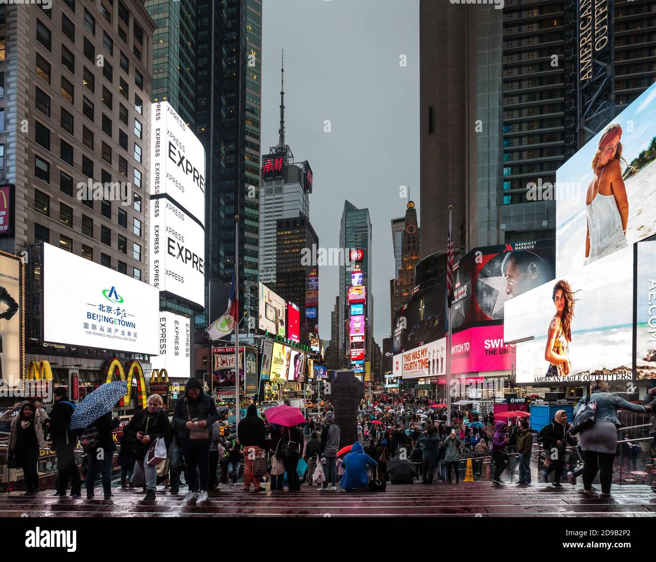 NEW YORK, USA - Apr 30, 2016: Times Square in the eveningin. Brightly adorned with billboards and advertisements, Times Square is sometimes referred t Stock Photo