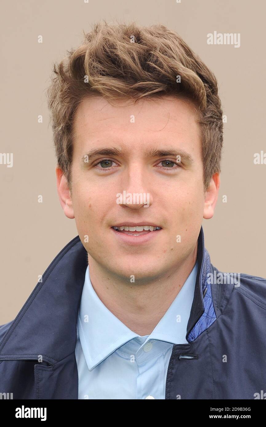 Greg James attends the Burberry Prorsum Menswear Spring/Summer 2014 catwalk show, Perks Field, Kensington Gardens, London. © Paul Treadway Stock Photo