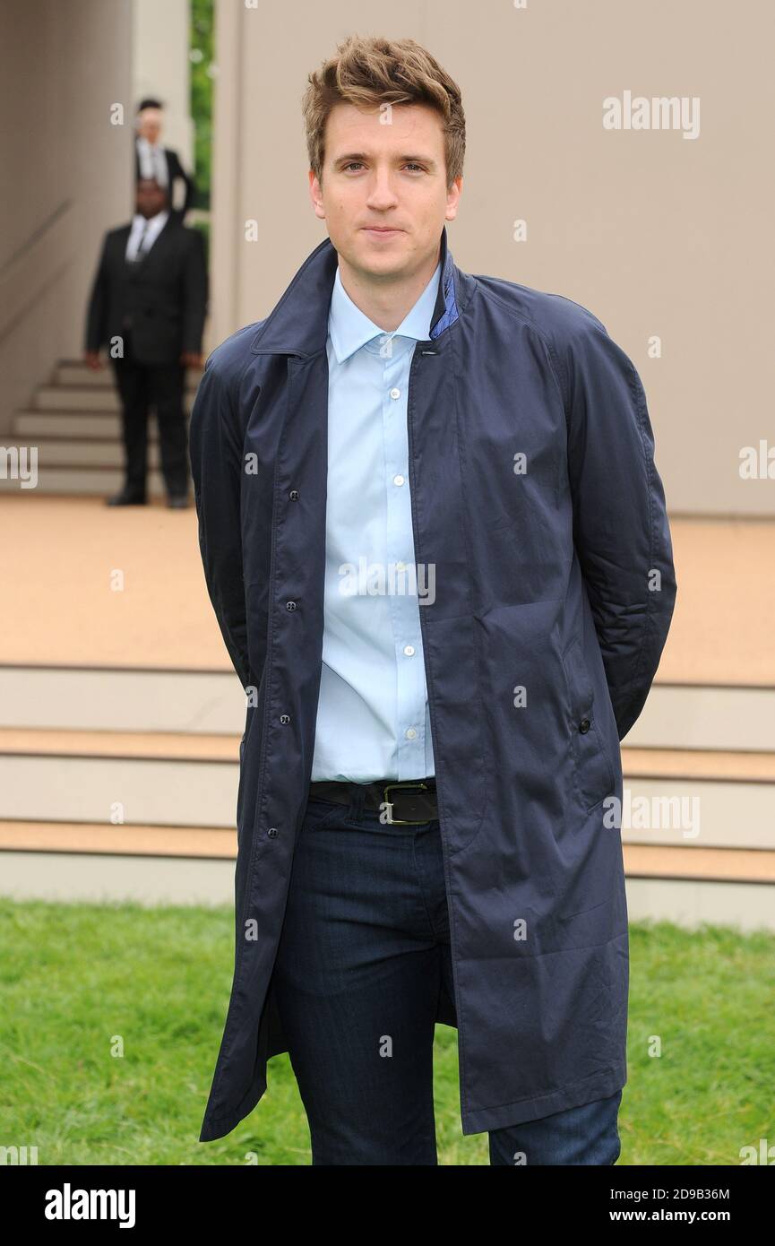 Greg James attends the Burberry Prorsum Menswear Spring/Summer 2014 catwalk show, Perks Field, Kensington Gardens, London. © Paul Treadway Stock Photo