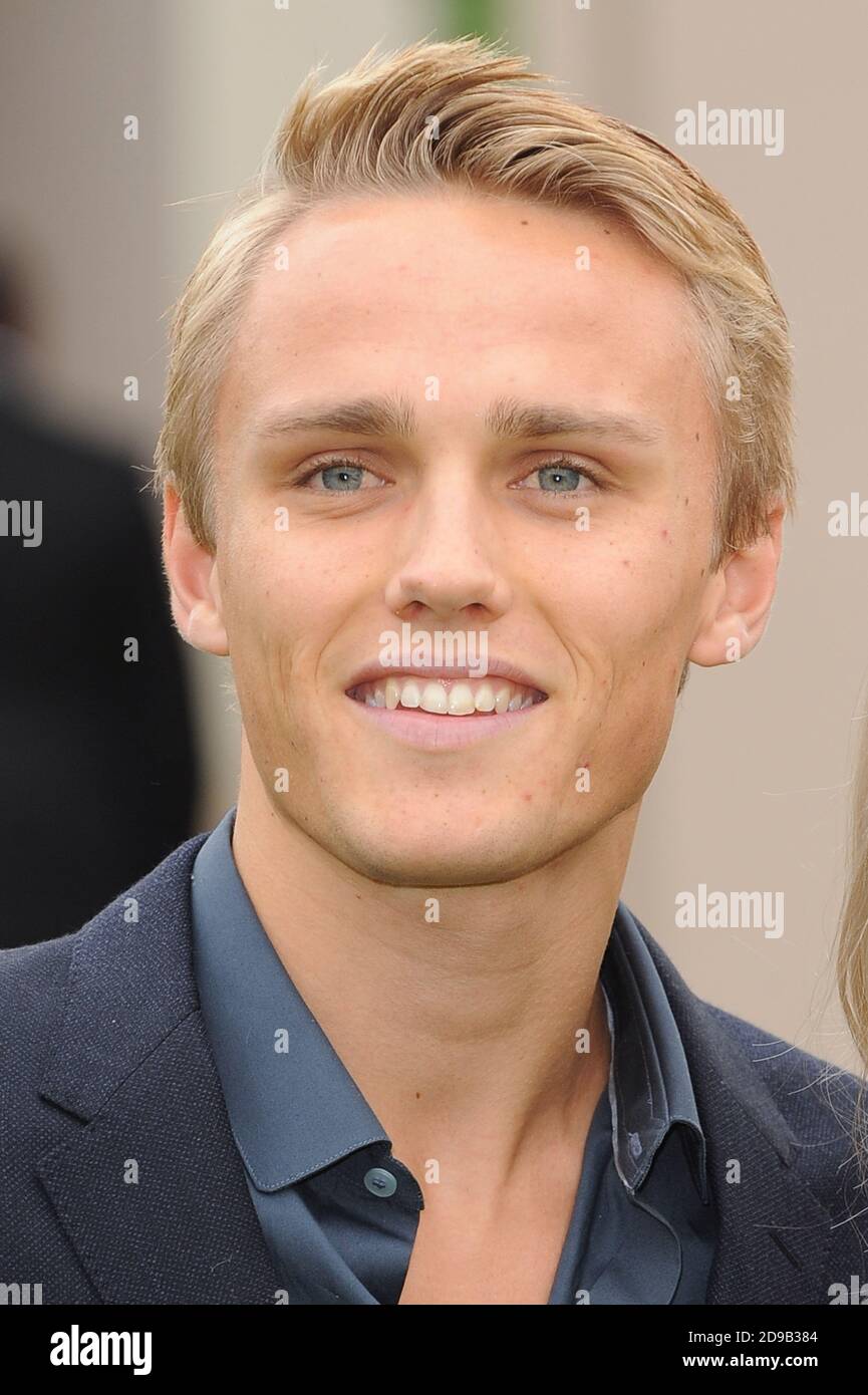 Max Chilton attends the Burberry Prorsum Menswear Spring/Summer 2014 catwalk show, Perks Field, Kensington Gardens, London. © Paul Treadway Stock Photo