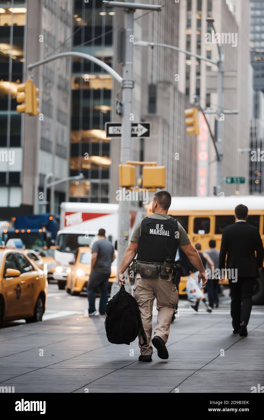 NEW YORK, USA - Sep 21, 2016: Manhattan street scene. US Marshal in the streets of New York City in the evening time Stock Photo