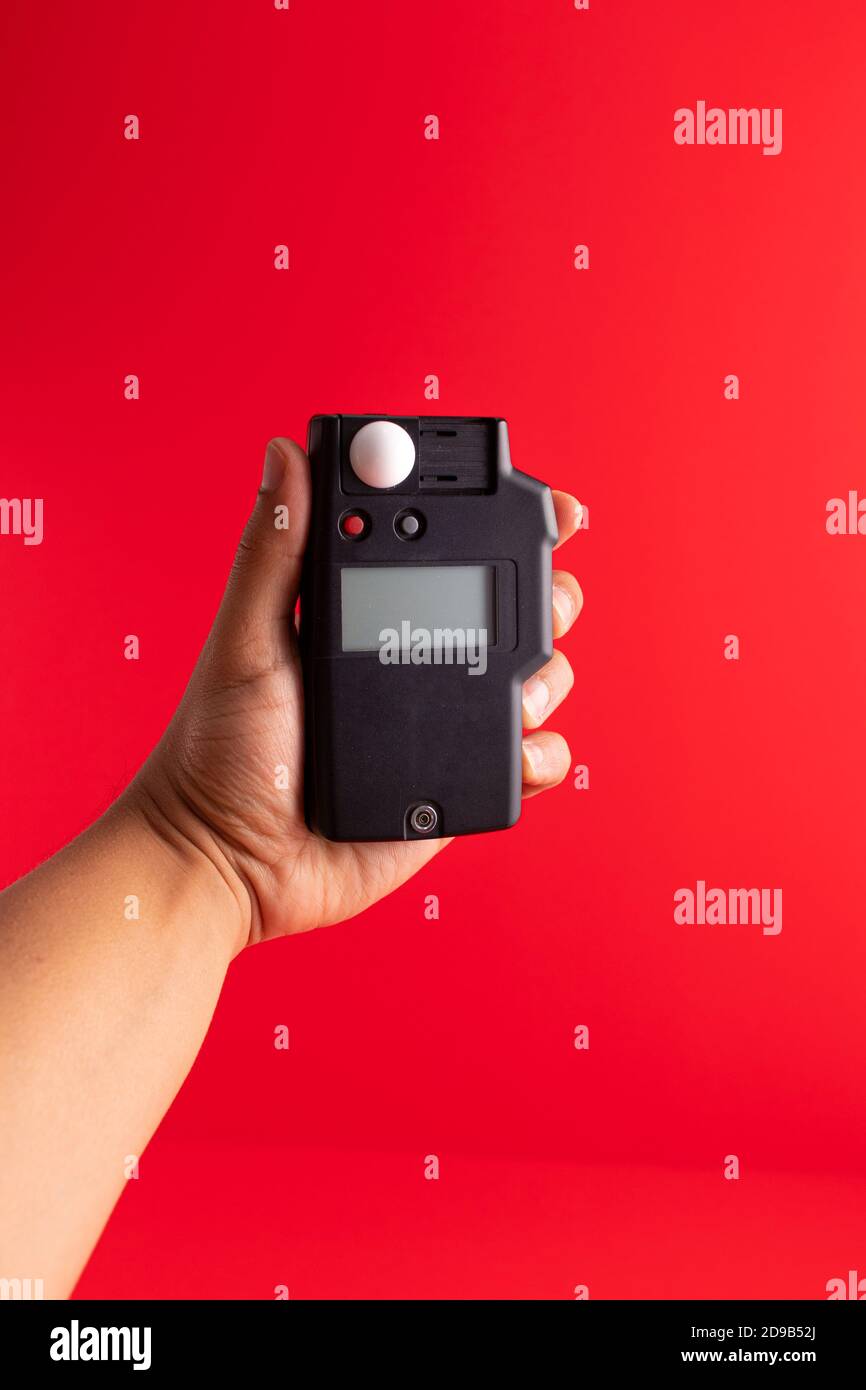 Handheld light measurement with photometer (exposure meter Stock Photo