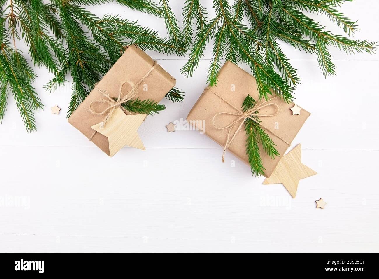 Christmas composition with fir tree branches and gift boxes on white ...