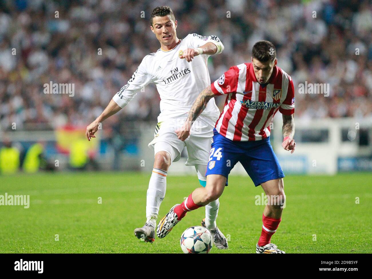 Cristiano Ronaldo of Real Madrid and José Ernesto Sosa of Atletico Madrid  during the Champion League
