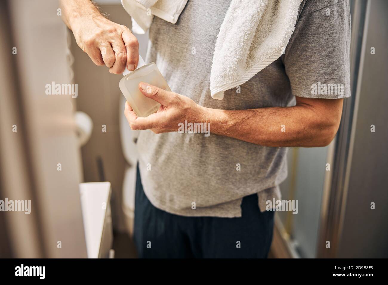 Man taking off clothes hi-res stock photography and images - Alamy