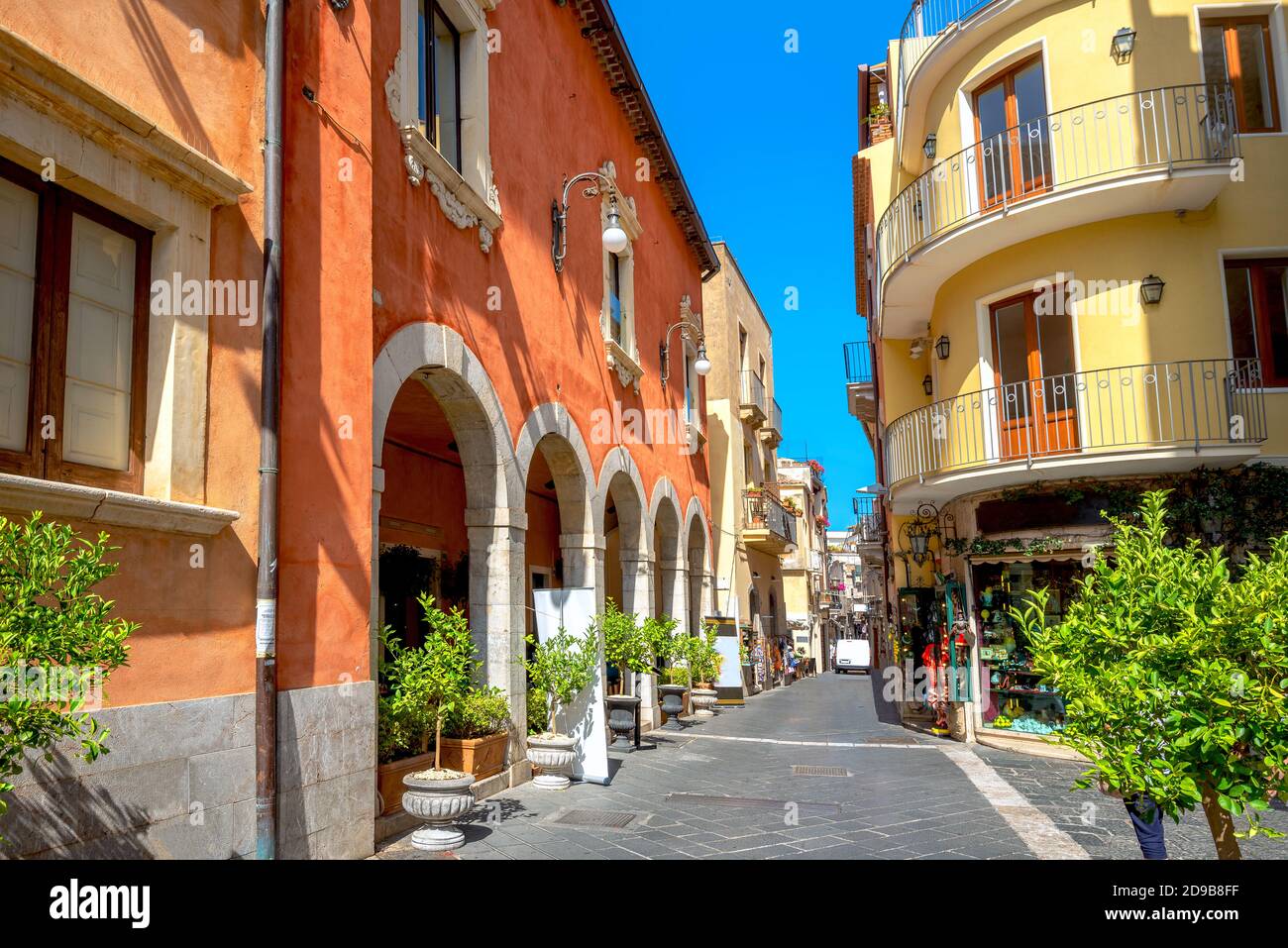 Picturesque vew of main street Corso Umberto in historic centre Taormina old city. Sicily, Italy Stock Photo
