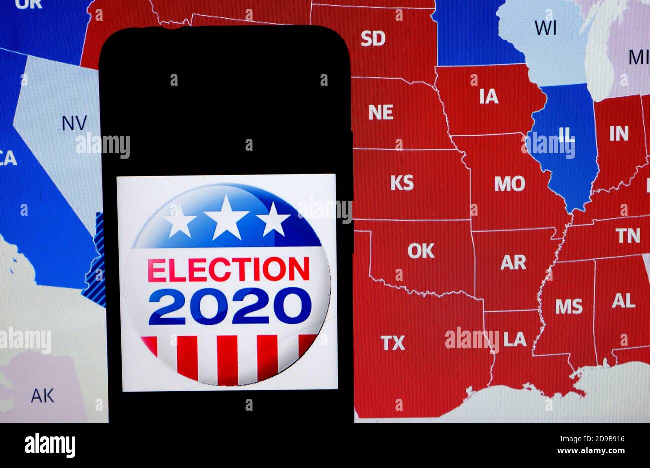 In this Photo illustration "Elections 2020"  is seen displayed on a smartphone screen with the background of US election results map. Stock Photo