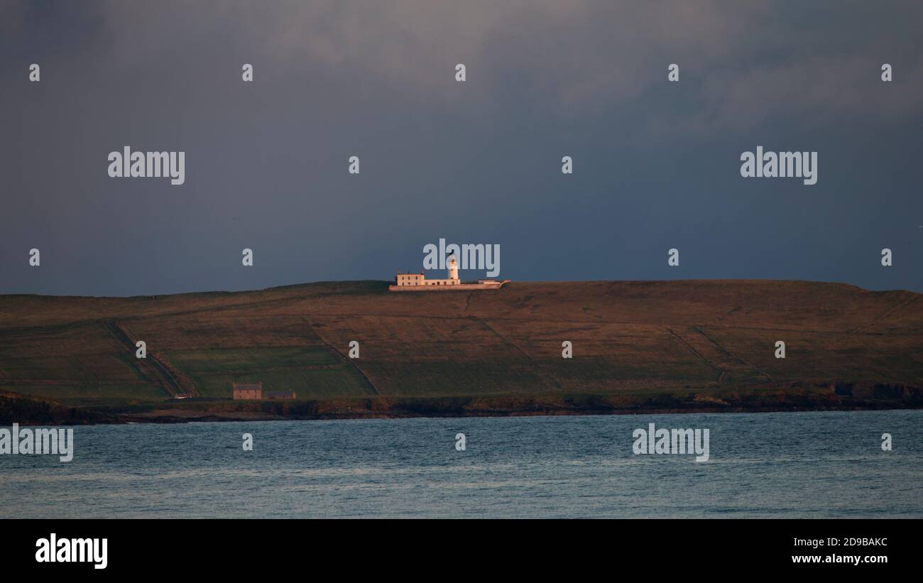 Copinsay island and lighthouse, Orkney isles Stock Photo