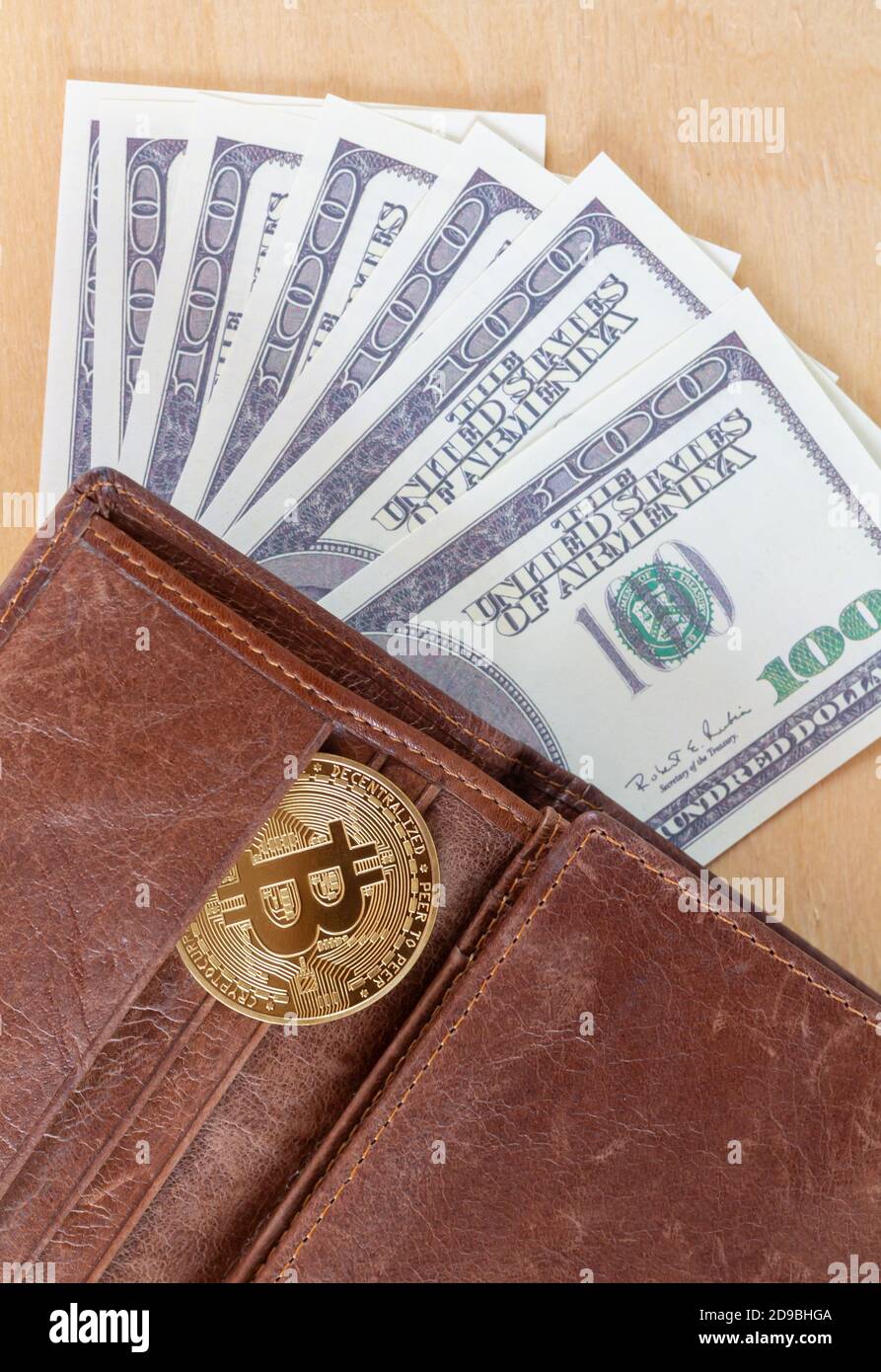 Bitcoin with paper dollars in wallet top view. Virtual cryptocurrency  trading and investment concept Stock Photo - Alamy