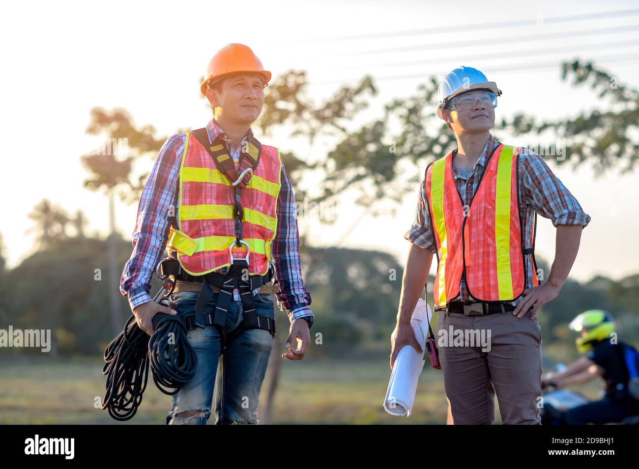 Two construction workers on a building site, Thailand Stock Photo