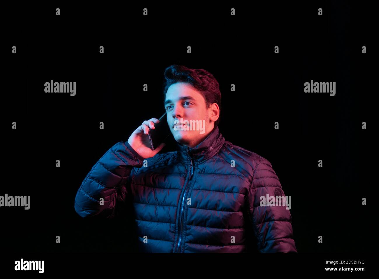 The guy is talking on his phone. Stock Photo