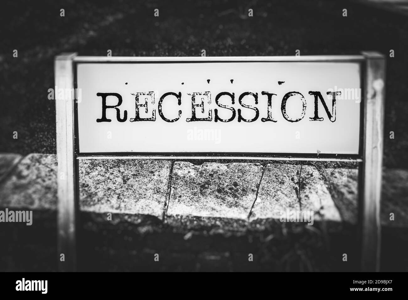 Recession on a road sign Stock Photo