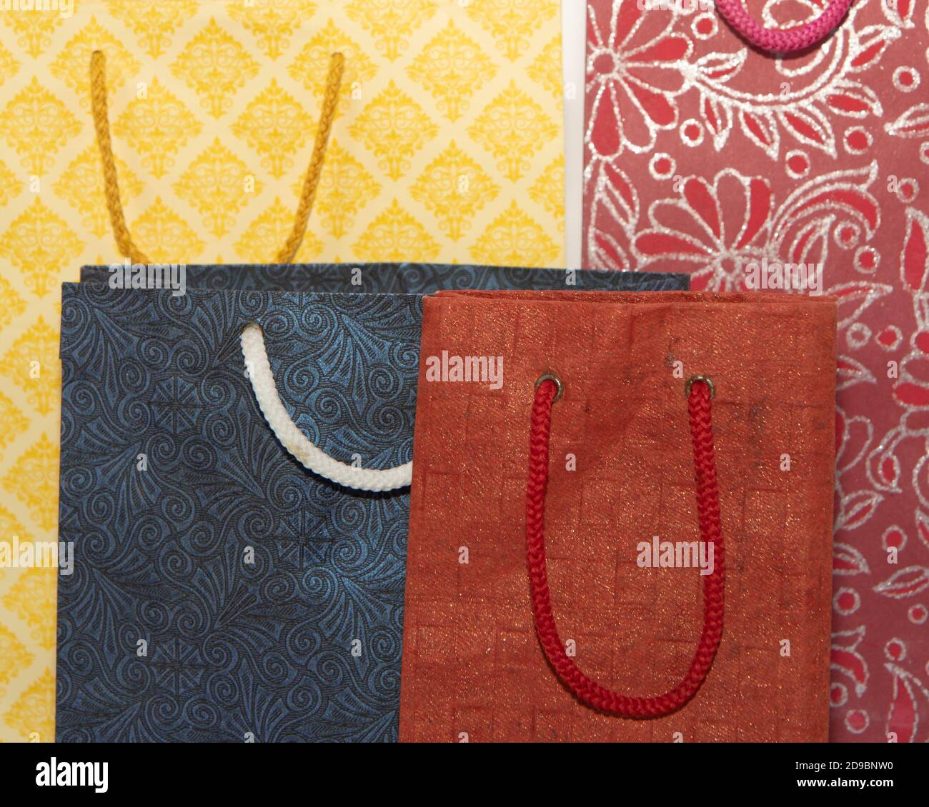 Hand made Paper Carry bags of various sizes and colors Stock Photo Alamy