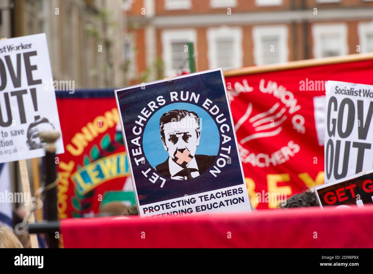 March in support of the national 24 hour teachers strike in England and Wales called by NUT (National Union of Teachers). The strike is to protest against government education reforms brought under Michael Gove the Conservative Secretary of State for Education, include changes to pay and conditions of teachers. The march started from Portland Place and finished at Parliament Square. Portland Place, London, UK.  26 Mar 2014 Stock Photo