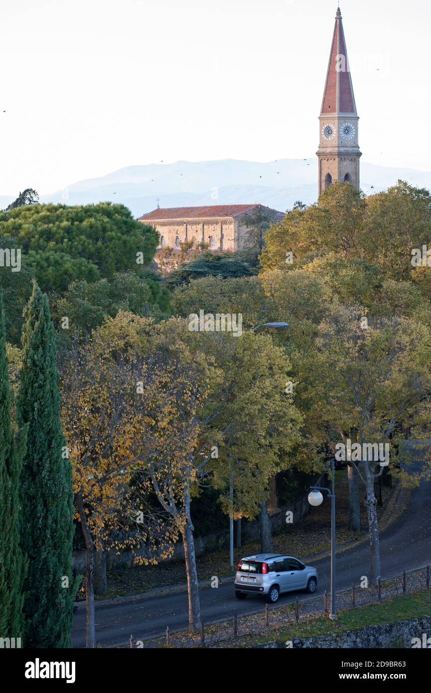 Arezzo, Italy - 2020, 30 October:  Tree-lined street near the Cathedral of Saint Donatus. Stock Photo
