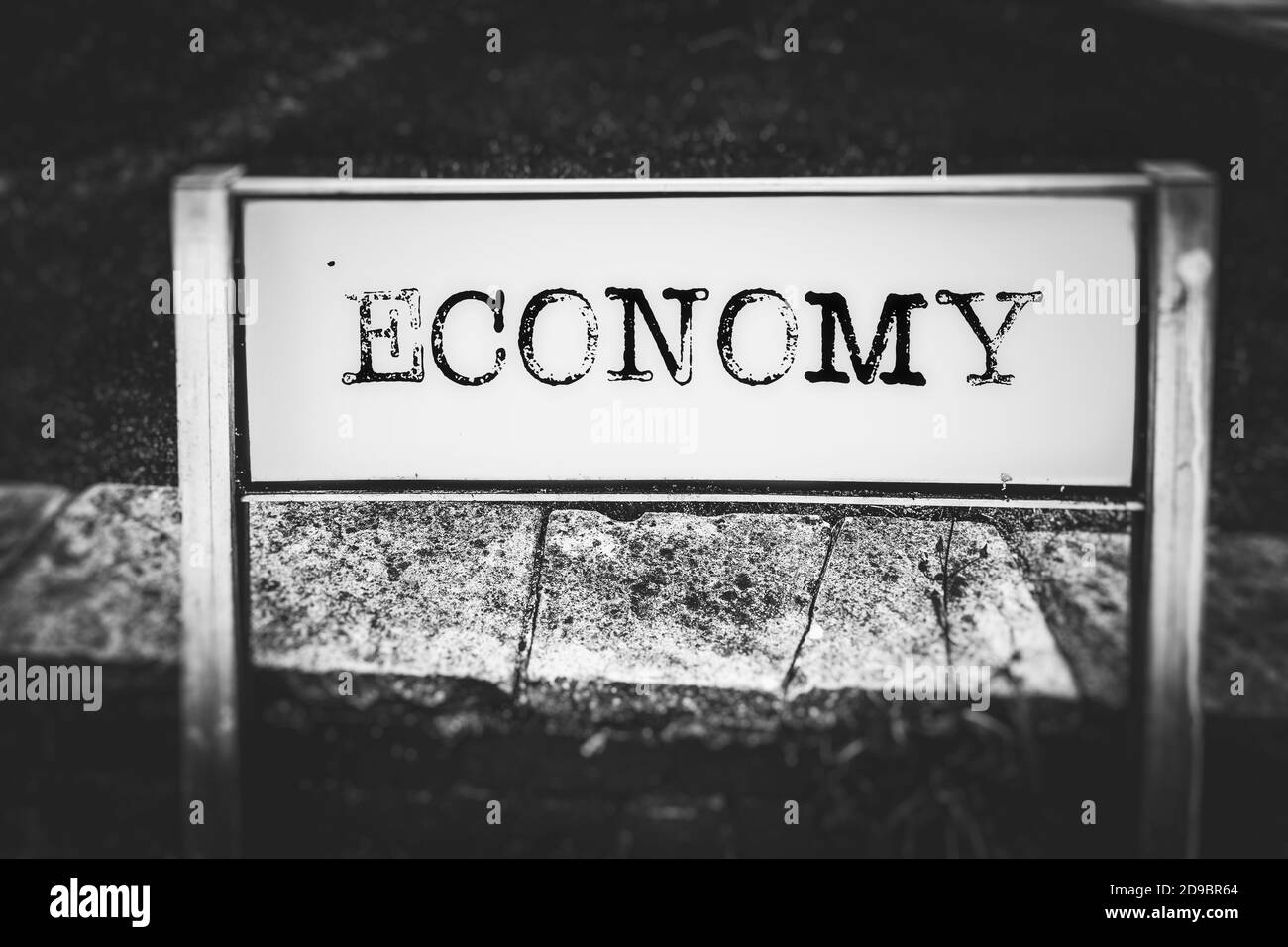 Economy on a road sign Stock Photo