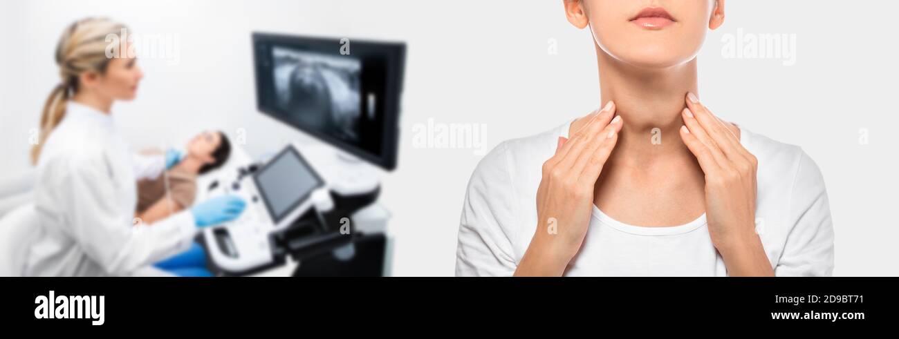 Woman palpation her neck, examine thyroid gland. Enlarged thyroid gland, close up. medical ultrasound diagnostics of the thyroid gland on background Stock Photo