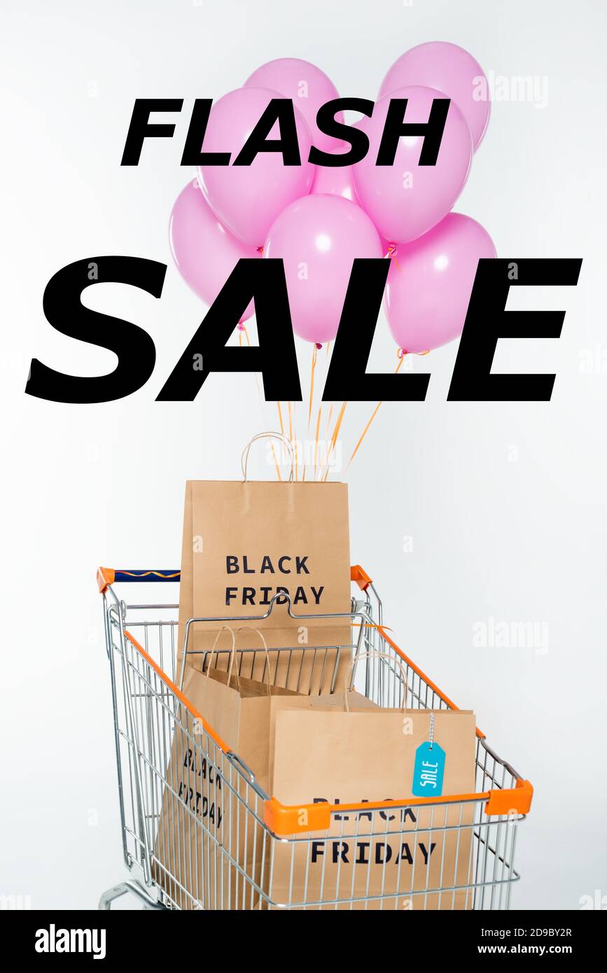 Shopping Bags With Black Friday In Cart With Pink Balloons Near Flash Sale Lettering On White Stock Photo Alamy