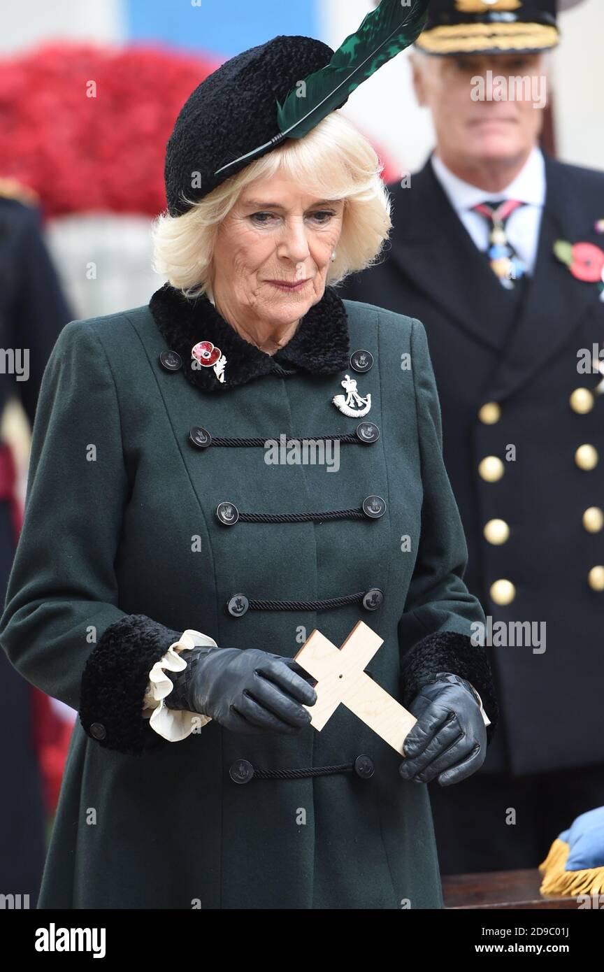 The Duchess of Cornwall, Patron of The Poppy Factory, has paid tribute to BritainÕs war dead by placing a cross in Westminster AbbeyÕs Field of Remembrance, in its 92nd year, at Westminster Abbey in London, ahead of Armistice Day. Stock Photo