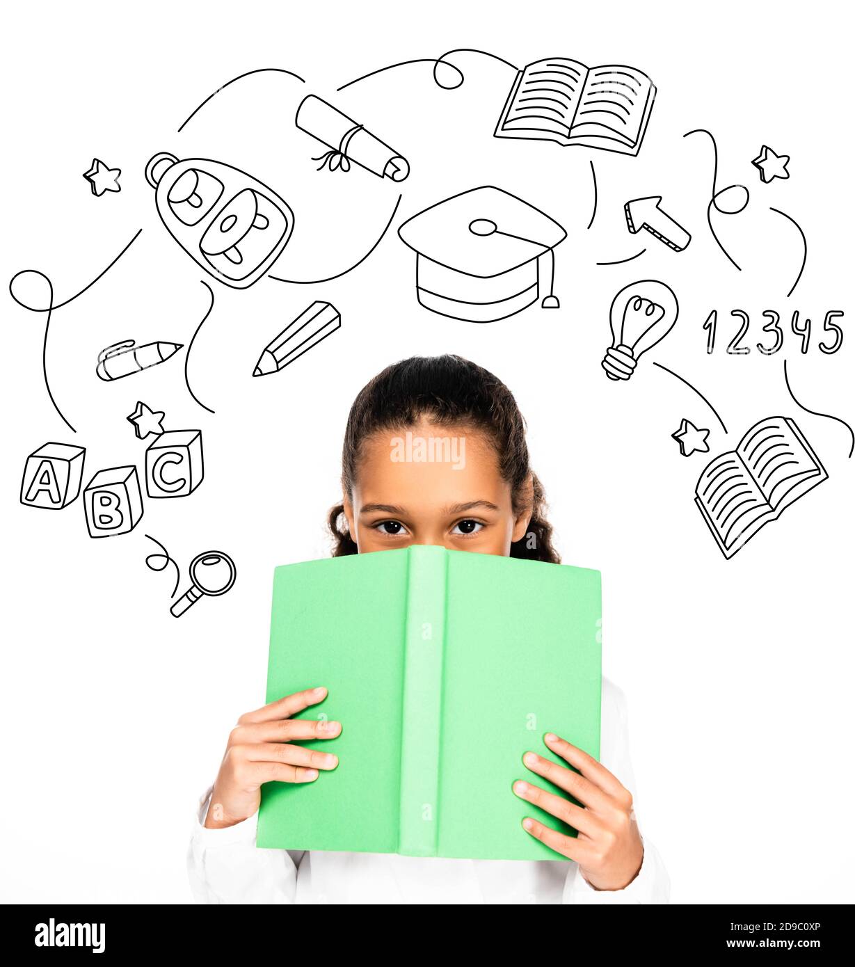 african american schoolgirl looking at camera while holding book near face isolated on white, educational illustration Stock Photo