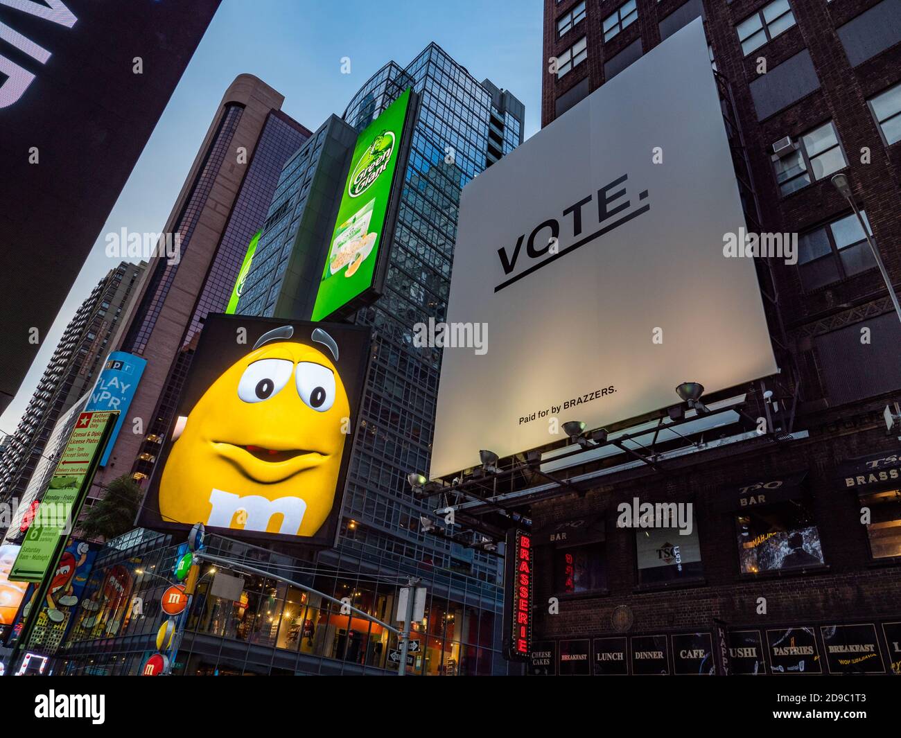 New York, New York, USA. 3rd Nov, 2020. Election Night in Times Square as the yellow M&M awaits the outcome of the Vote. He seems apprehensive. The candy company has a huge flagship store in the middle of NYC. Credit: Milo Hess/ZUMA Wire/Alamy Live News Stock Photo