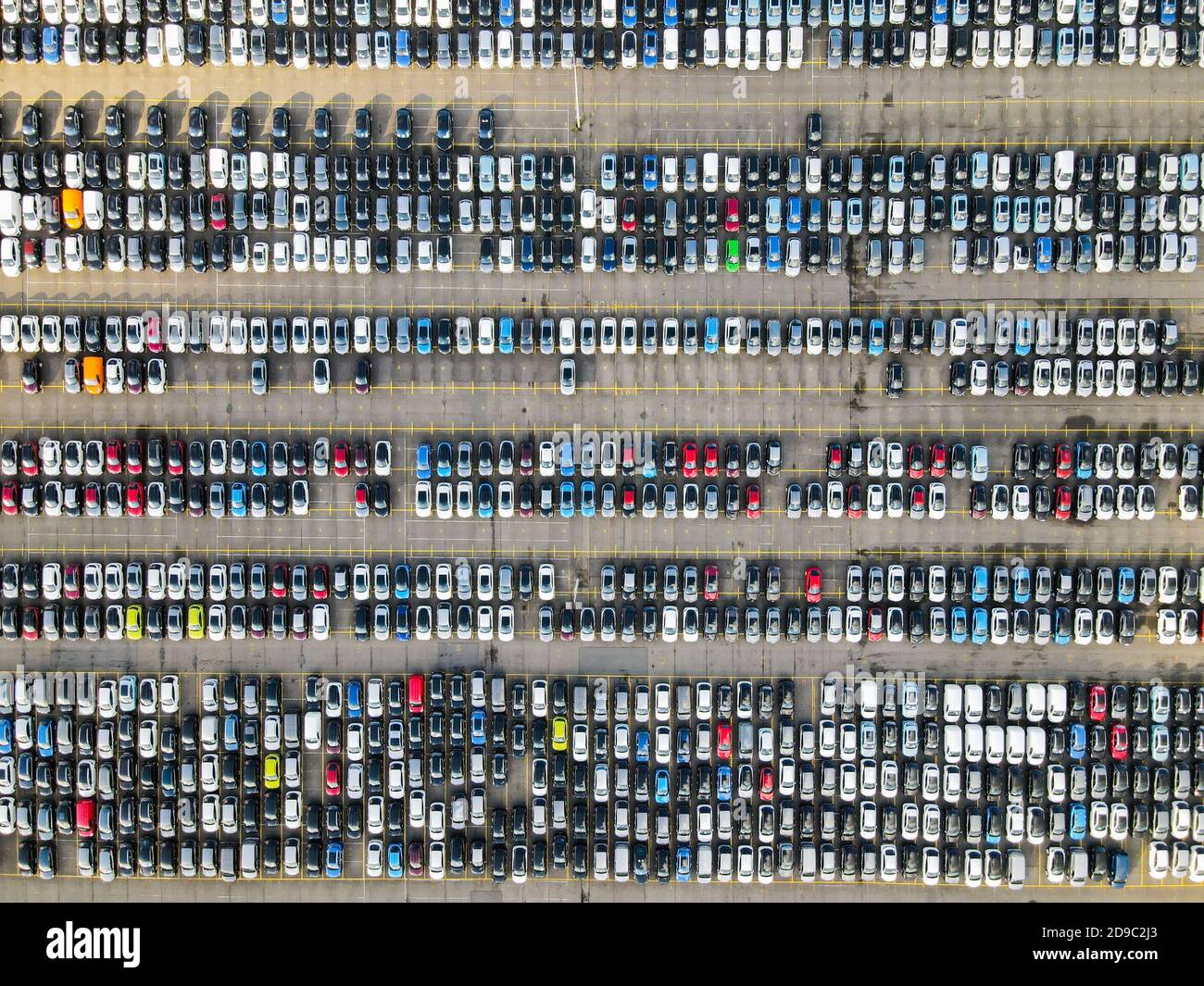 Aerial shot of parked cars in a structured row parking lease cars new production industry Stock Photo