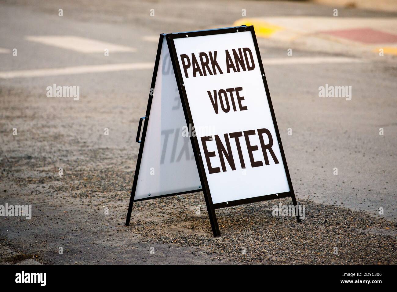 Helena, Montana / November 3, 2020: Park and vote sign in street outside of polling station, Election Day voting for president, Lewis and Clark County Stock Photo