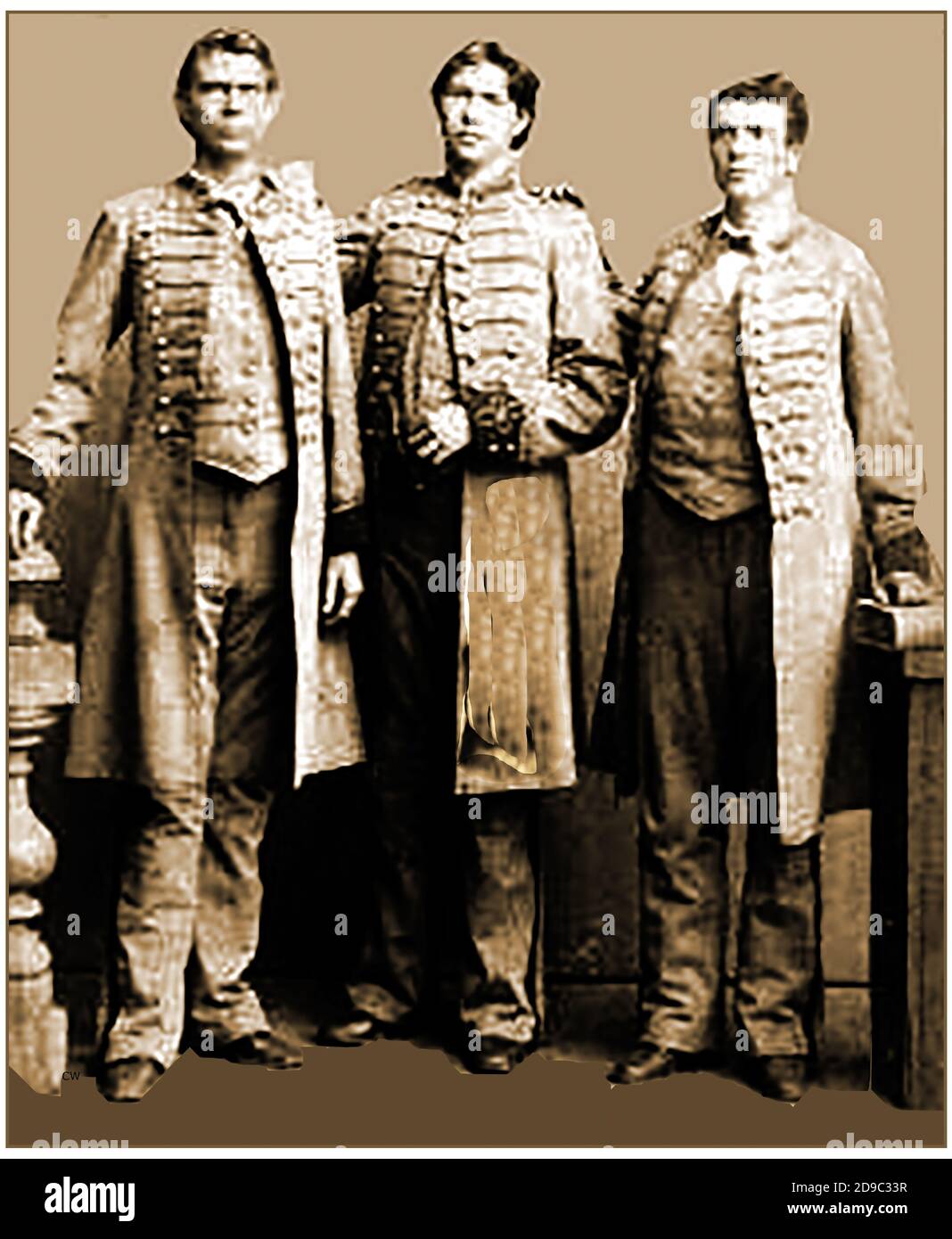 The three American 'Giant Brothers'. This old photograph gives no details but they are believed to have been the 3 of  4 travelling Shields Brothers,  sometimes advertised as the Texas Giants. They were actually part of a larger family of exceptionallyn tall brothers, four of which toured with freak shows and with Barnum & Bailey's Circus, though alternating brothers and even other tall men were sometimes part of the line-up.  Various (perhaps exaggerated) claims were given as to their height, but all touring brothers appear to have exceeded seven feet in height. They didn't  have  acromegaly. Stock Photo