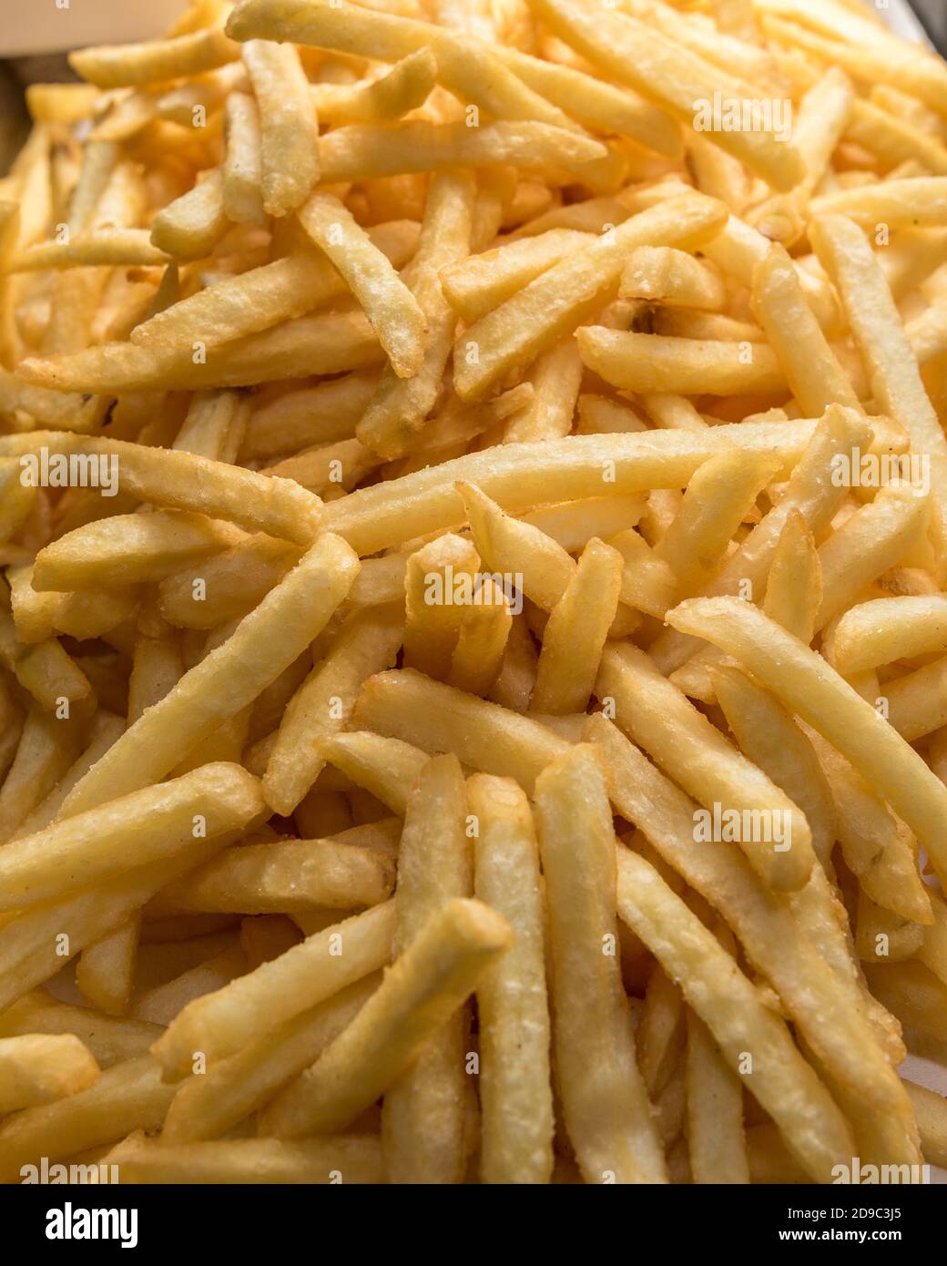 freshly fried golden fries Stock Photo
