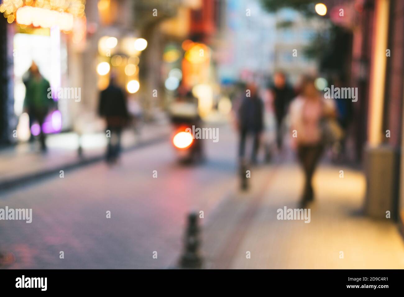 Bright defocused blurred background with unrecognizable people on the sity  street. Abstract image of crowd of people in public place Stock Photo -  Alamy