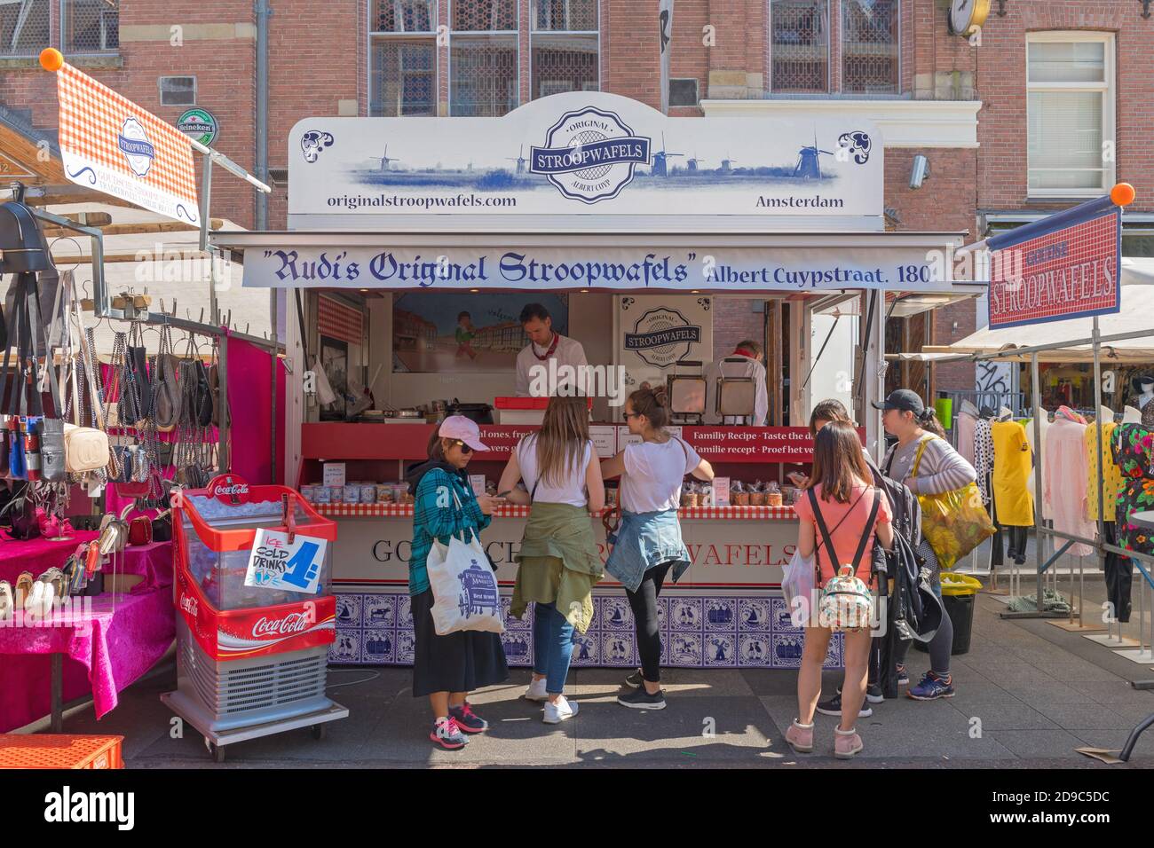 Amsterdam, Netherlands - May 15, 2018: People Waiting for Famous Stroop Wafels at Street Market in Amsterdam, Holland. Stock Photo
