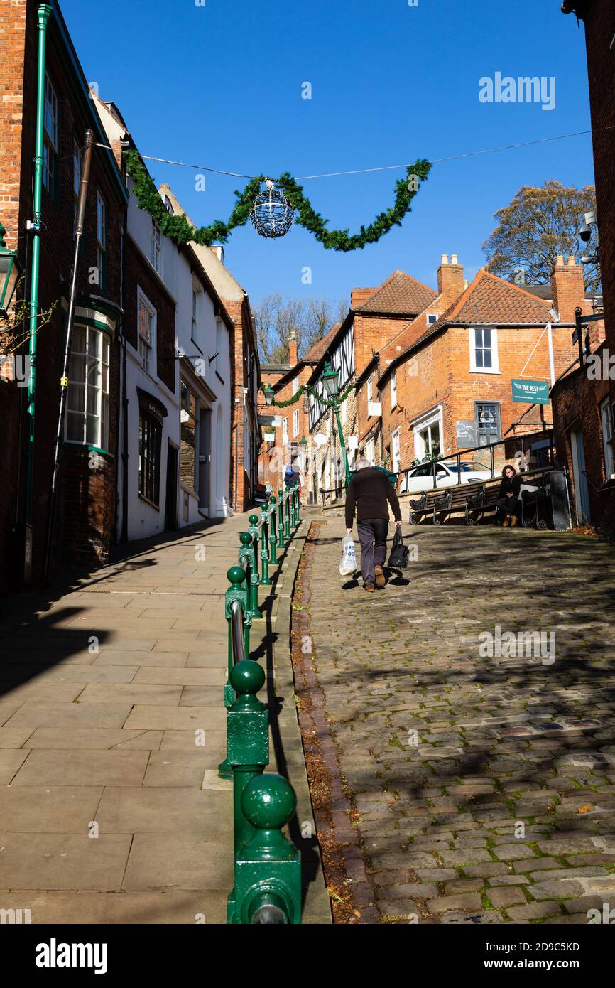 Trudging up Steep Hill, Lincoln, Lincolnshire, England, United Kingdom. Stock Photo