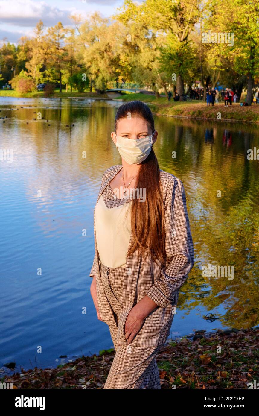 Young woman wearing surgical mask hi-res stock photography and images ...