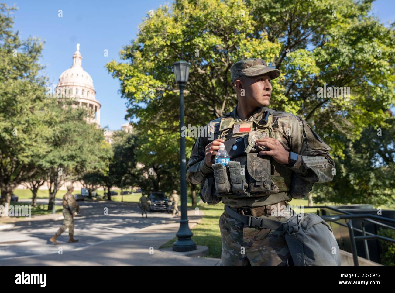 National Guard Specialist William Cruz of Corpus Christi guards the west gate of the Texas Capitol on the afternoon of Election Day, November 3, 2020. Cruz said that the Guard has been deployed to assist the Texas Department of Public Safety (DPS) in care of any election unrest tonight. Stock Photo