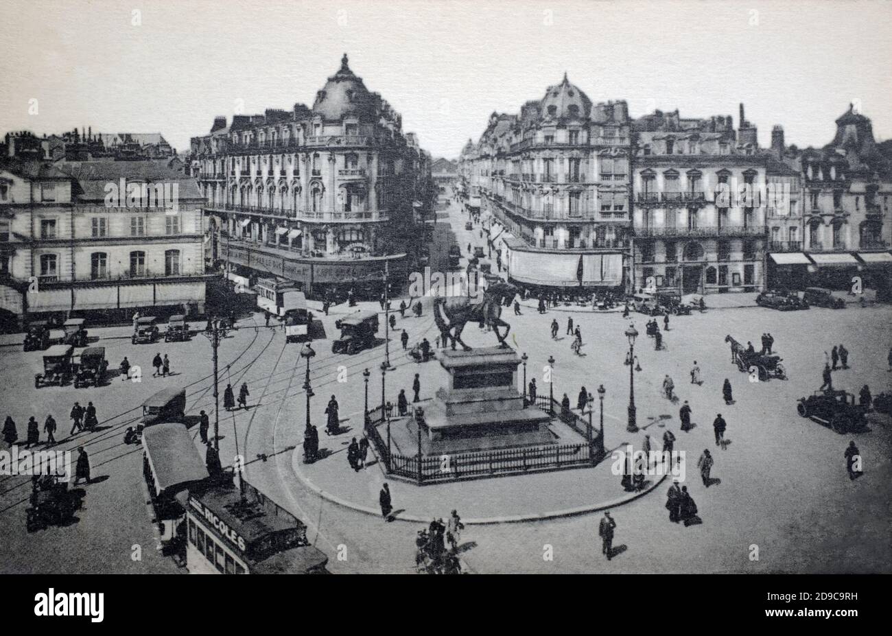 A historical view of the Joan of Arc statue and the Place du Martroi with the Rue de la République behind leading to the train station in Orléans, Centre-Val de Loire, France, taken from a postcard c.early 1900s. Stock Photo