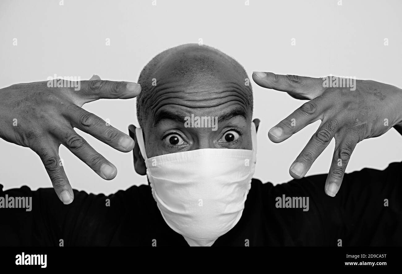 Black men wearing mask Black and White Stock Photos & Images - Alamy