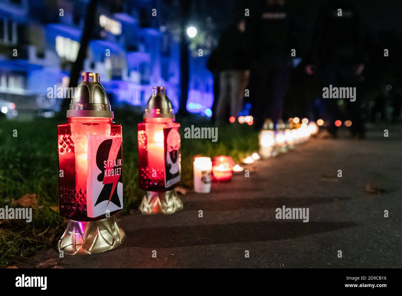Cemetery candles with the symbols of Polish Female Strike seen during protest.  On 22 October, the Polish Constitutional Court ruled that abortion is Stock Photo