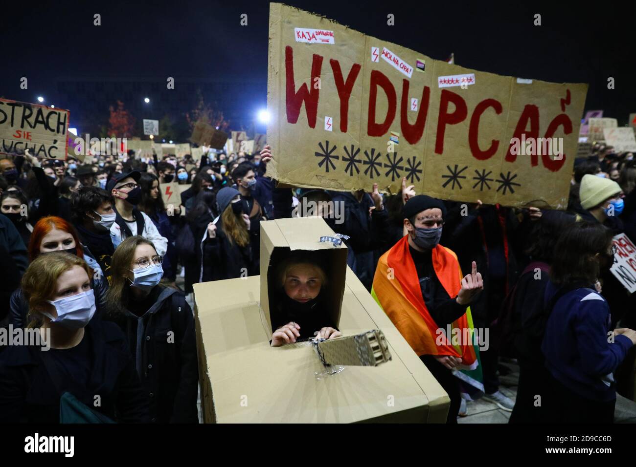 A protester standing in a cardboard tank.  The Polish Constitutional Court in its new, politically chosen courthouse ruled that abortion is unconstitu Stock Photo