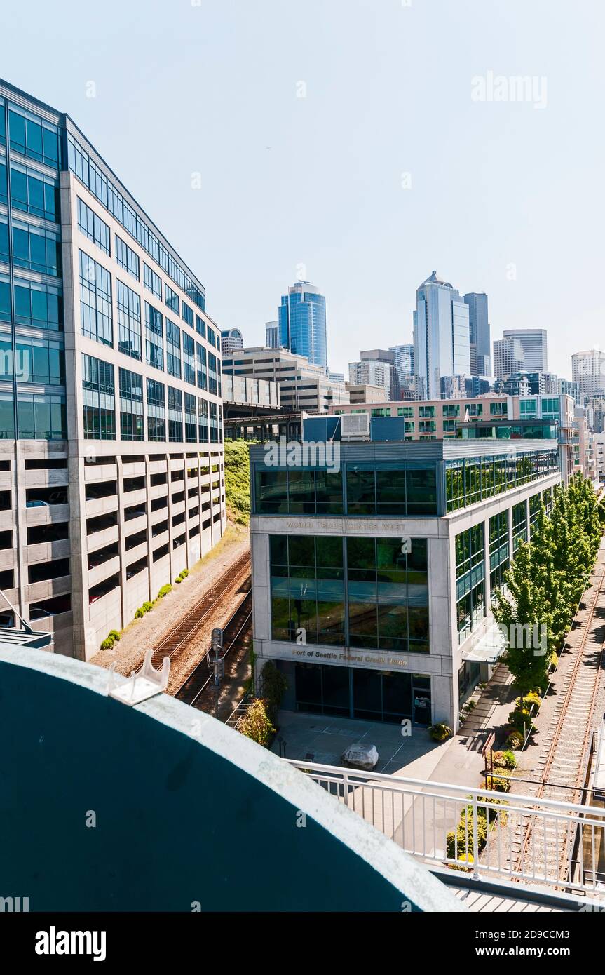 Elevated view southeast on Alaskan Way around Pier 70 in Belltown in Seattle, Washington, including World Trade Center West building. Stock Photo