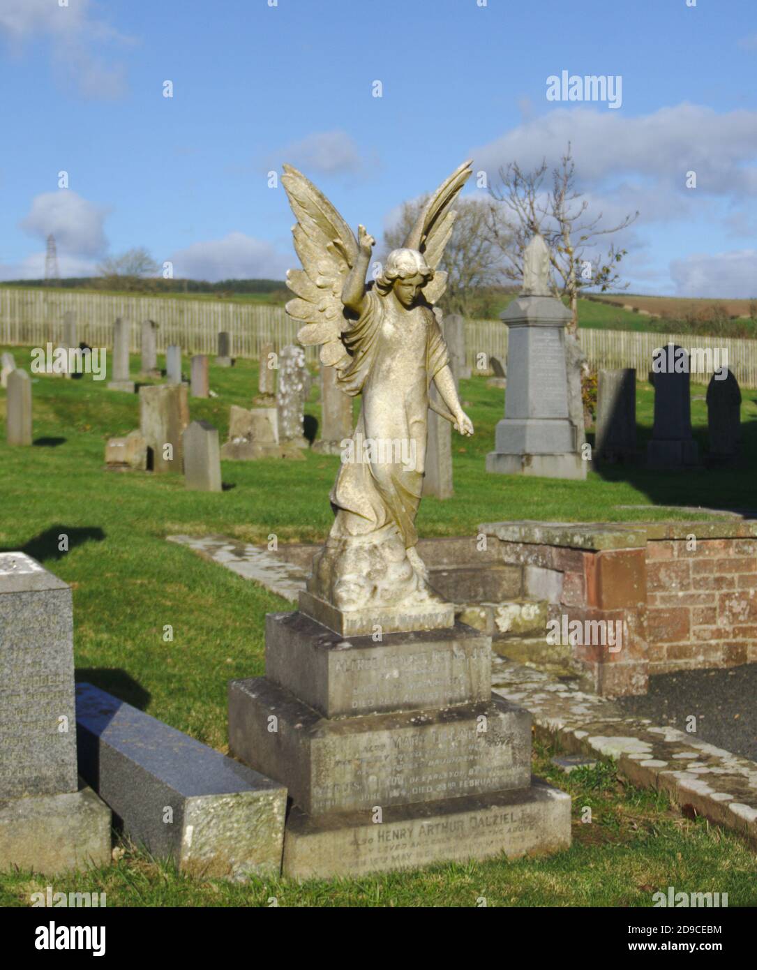 Stone angel on the memorial of the Dalziel family in the graveyard of Earlston Parish Church, Berwickshire, Scottish Borders, Scotland, UK. Stock Photo