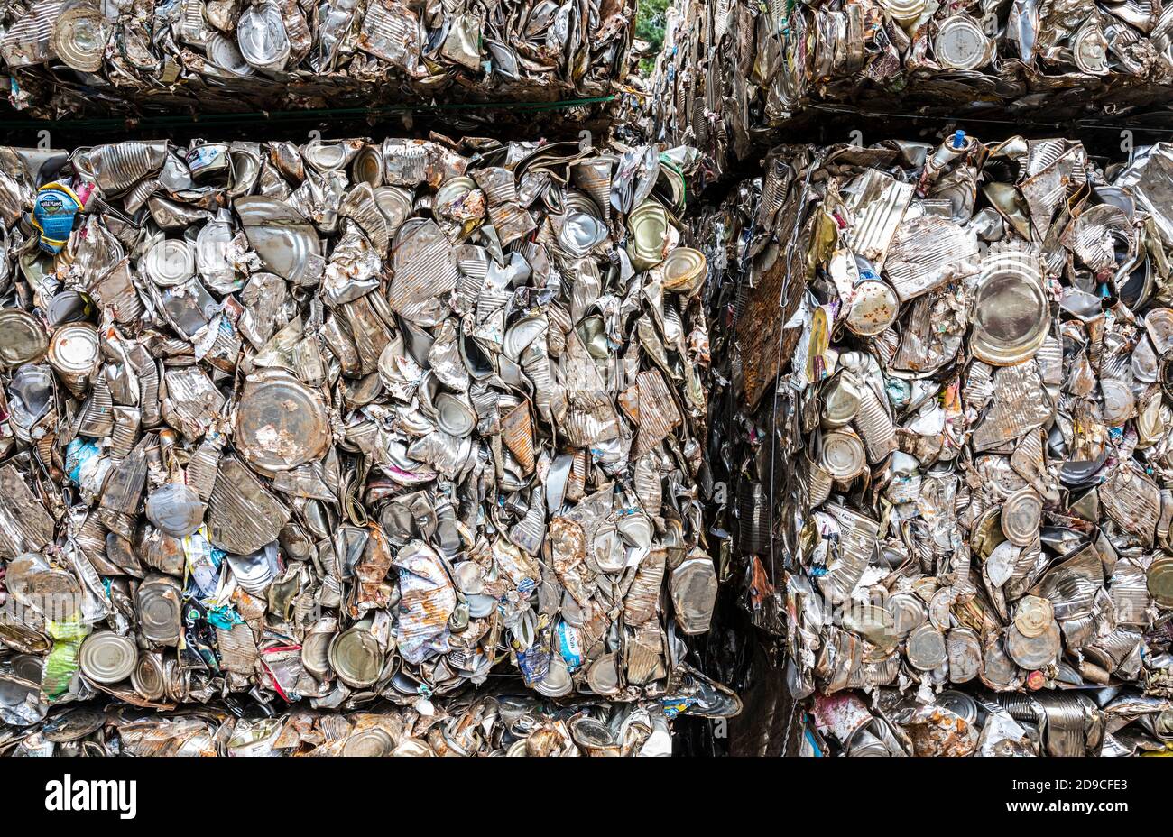 Steel cans smashed into cubes for recycling Stock Photo Alamy