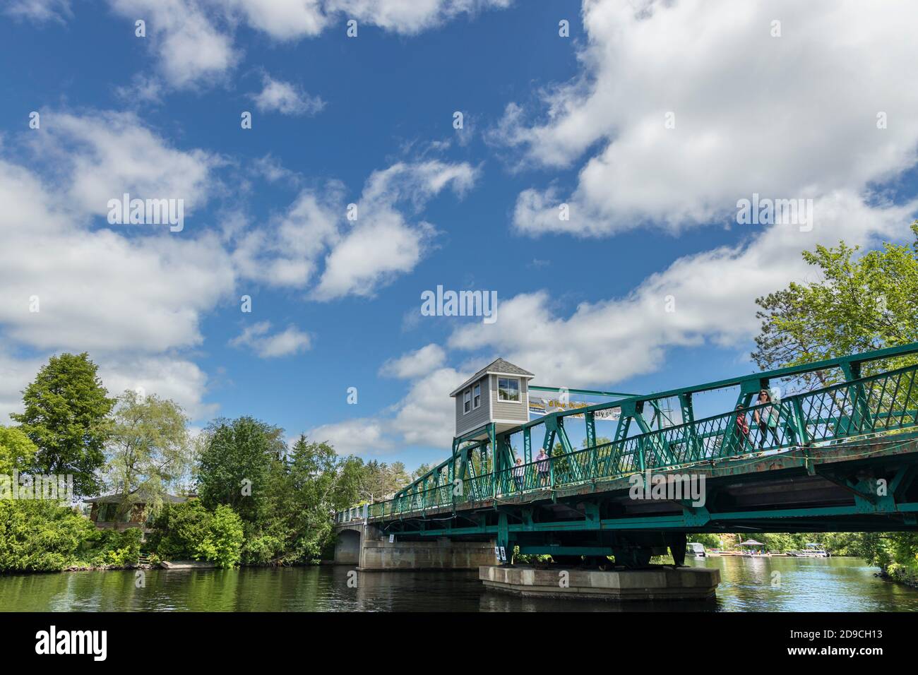 A view of the Huntsville Swing Bridge from the Town Dock Park on the Muskoka River. Stock Photo
