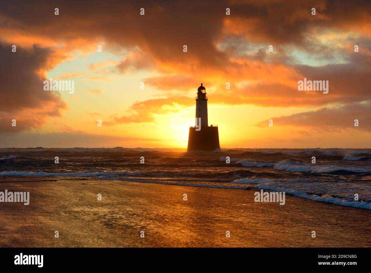 Rattray Head Lighthouse at sunrise, Aberdeenshire Stock Photo