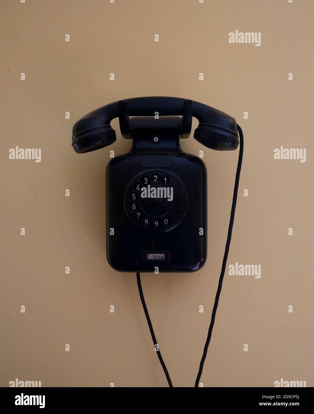 old telephone on the wall Stock Photo Alamy