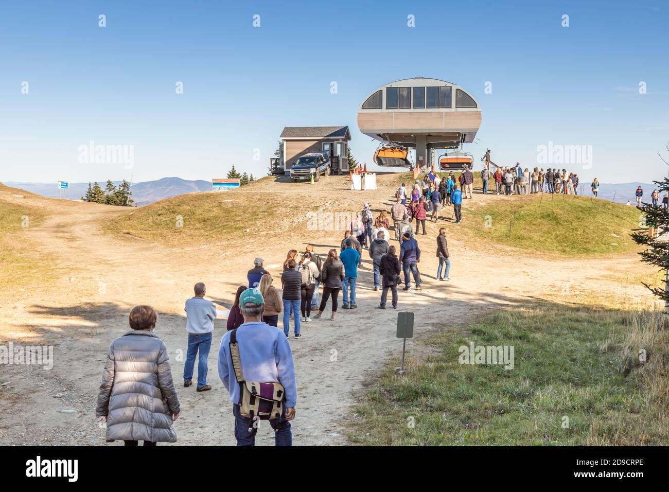 Line of people waiting for the lift at Okemo Mountain resort, Ludlow, VT Stock Photo