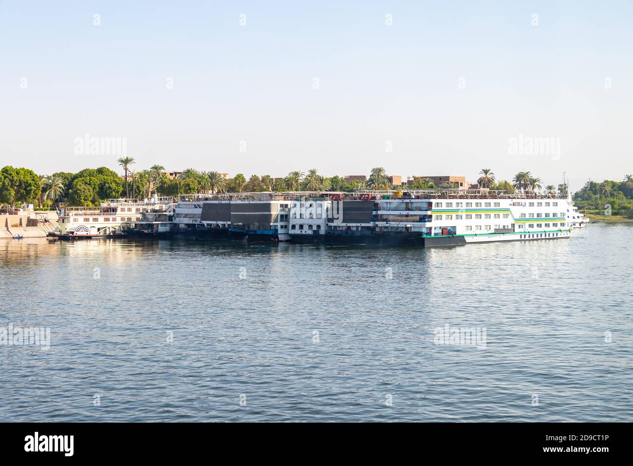 Aswan, Egypt - September 16, 2018: A lot of Floating hotels (tourist boats) moored between Luxor and Aswan in central Egypt for lack of tourism Stock Photo