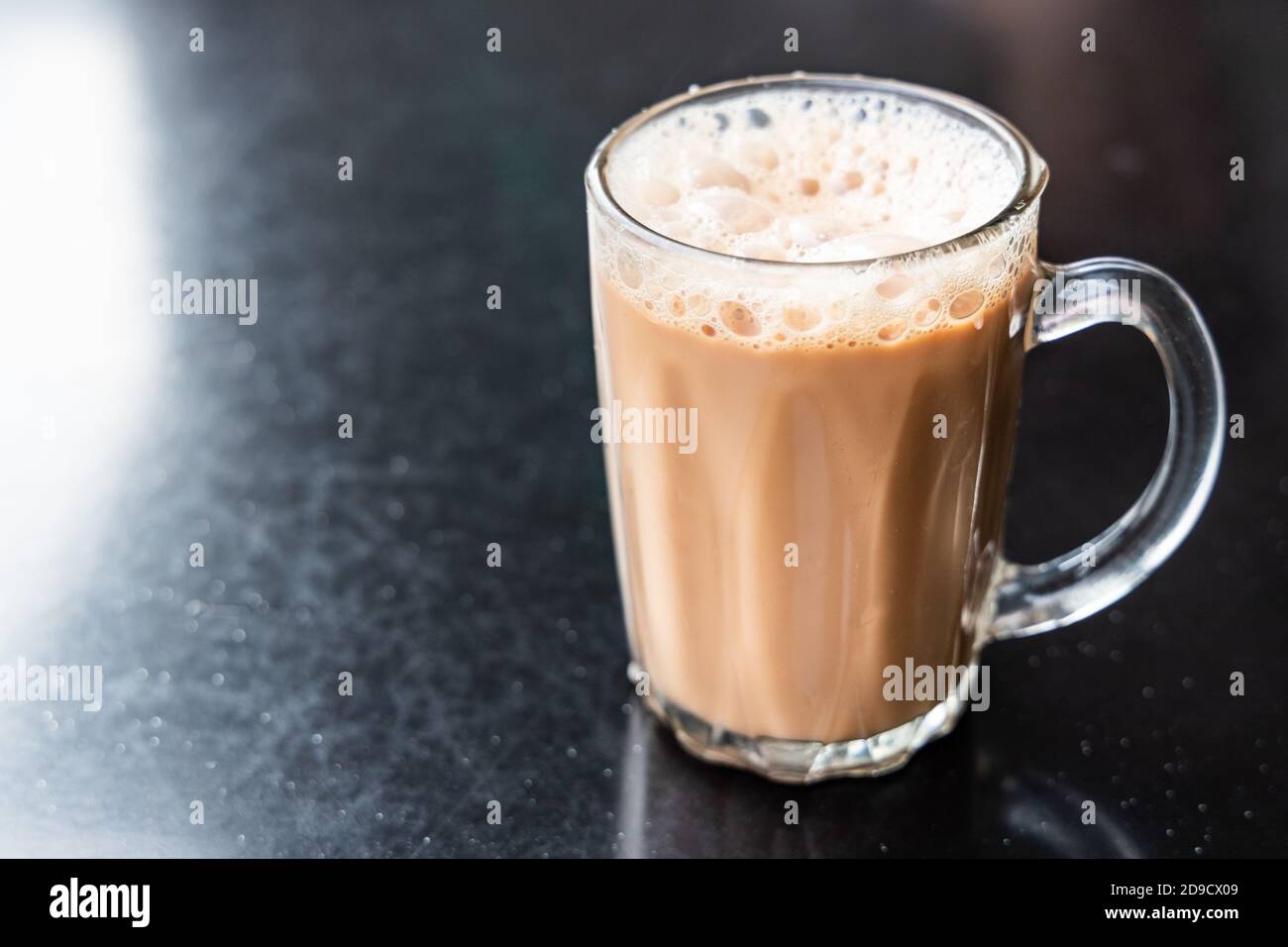 Teh tarik, milk tea with froth. Popular drink in Malaysia. Stock Photo